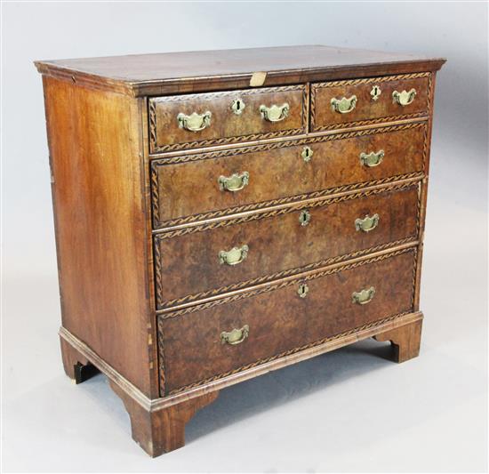 An early 18th century burr walnut chest, W.3ft 3in. D.1ft 10in. H.2ft 11in.